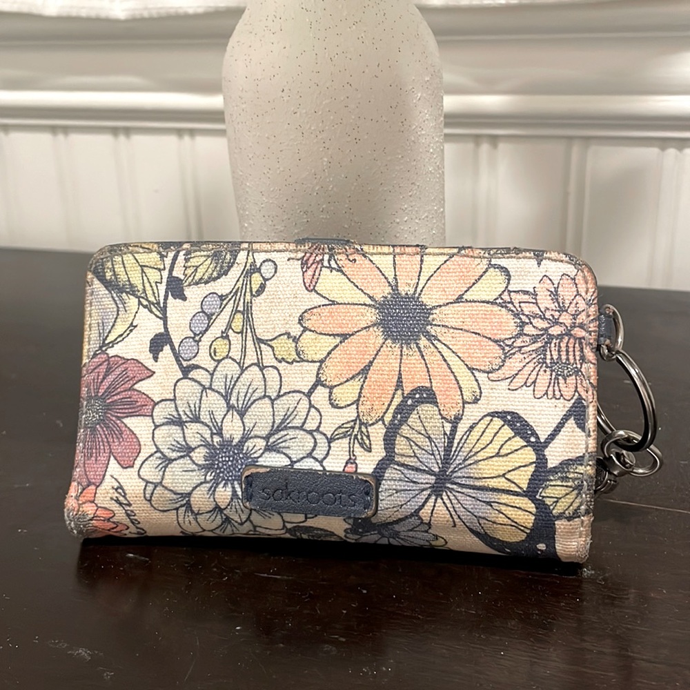 Sakroots womens wallet. Cream floral and butterfly. Used.